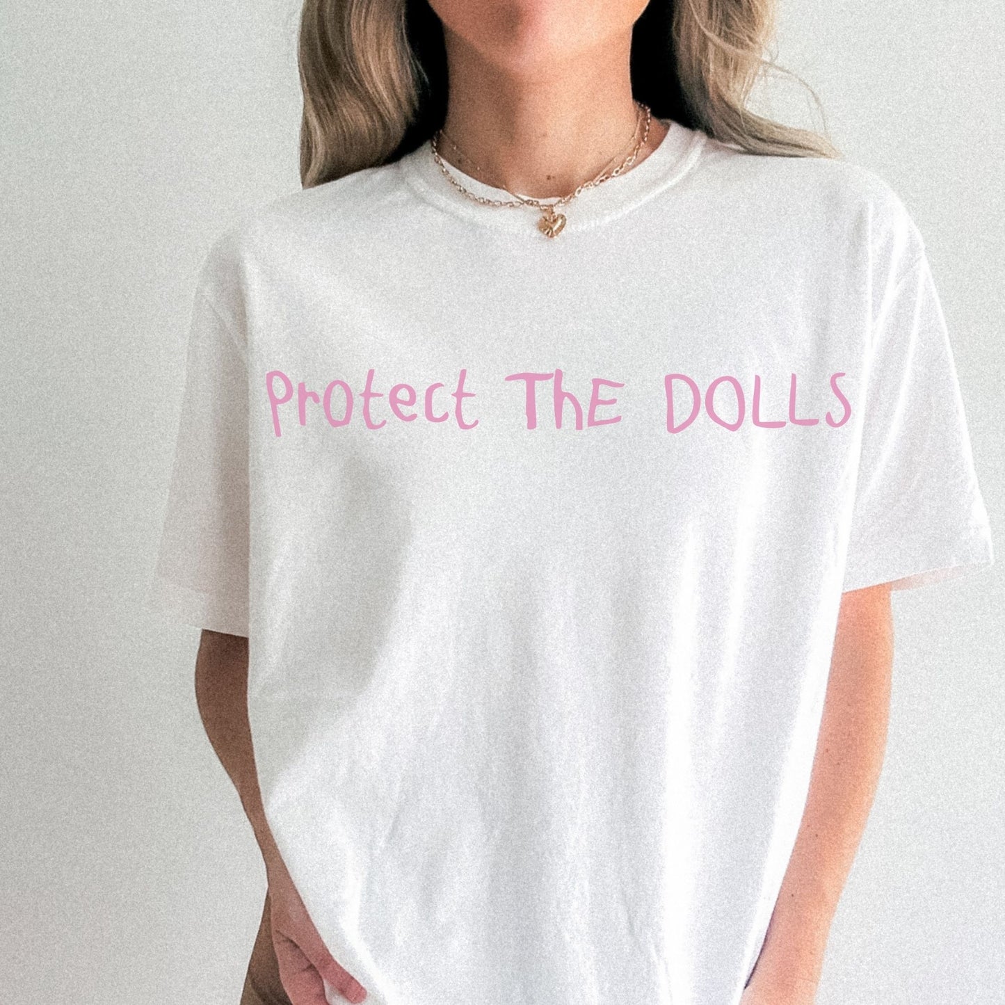 Protect The Dolls – Pink Bio Unisex T-Shirt
